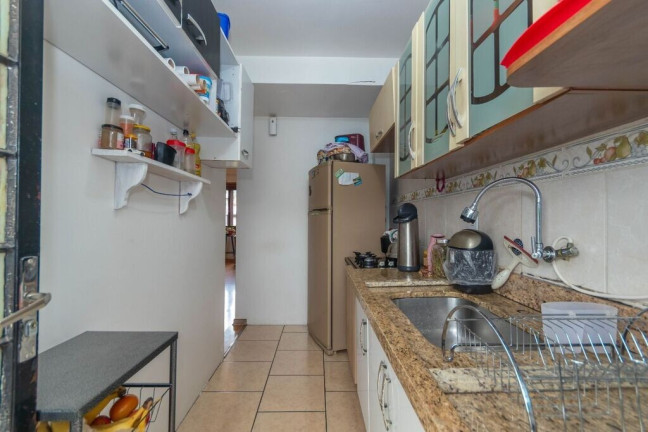 Imagem Casa com 3 Quartos à Venda, 174 m² em Nonoai - Porto Alegre