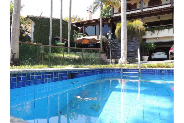 Imagem Casa com 4 Quartos à Venda, 430 m² em Vila Assunção - Porto Alegre