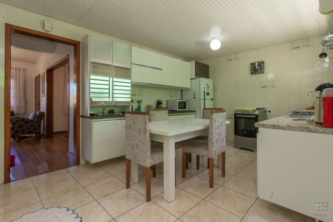 Imagem Casa com 3 Quartos à Venda, 216 m² em Vila Nova - Porto Alegre
