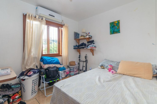 Imagem Casa com 3 Quartos à Venda, 174 m² em Nonoai - Porto Alegre