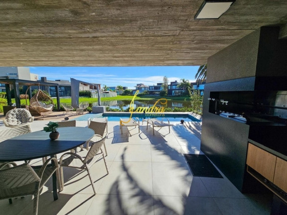 Imagem Casa de Condomínio com 4 Quartos à Venda, 254 m² em Centro - Xangri-la