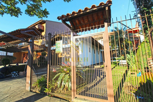 Imagem Casa com 4 Quartos à Venda, 300 m² em Ipanema - Porto Alegre