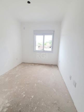 Imagem Casa de Condomínio com 2 Quartos à Venda, 64 m² em Vila Nova - Porto Alegre