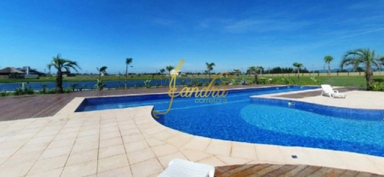 Imagem Casa de Condomínio com 4 Quartos à Venda, 383 m² em Rainha Do Mar - Xangri-la
