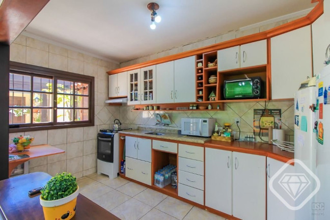 Imagem Casa com 3 Quartos à Venda, 198 m² em Cavalhada - Porto Alegre