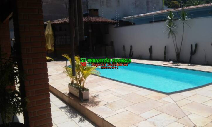 Imagem Casa com 4 Quartos à Venda, 400 m² em Caraguatatuba