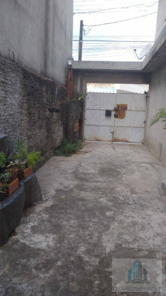 Imagem Sobrado com 5 Quartos à Venda, 210 m²