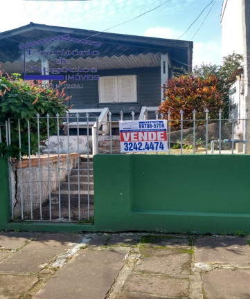 Imagem Casa com 6 Quartos à Venda, 150 m² em Cavalhada - Porto Alegre