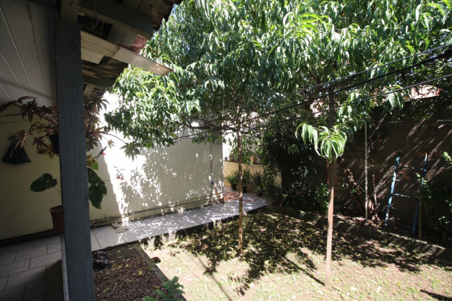 Imagem Casa com 4 Quartos à Venda, 131 m² em Uberaba - Curitiba