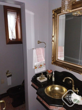 Imagem Casa de Condomínio com 4 Quartos à Venda, 550 m² em Cavalhada - Porto Alegre