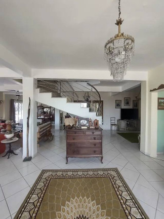Imagem Casa com 4 Quartos à Venda, 329 m² em Vila Nova - Porto Alegre