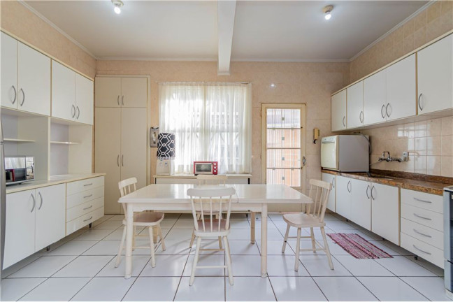 Imagem Casa com 4 Quartos à Venda, 360 m² em Menino Deus - Porto Alegre