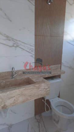 Imagem Casa com 3 Quartos à Venda, 74 m² em Golfinho - Caraguatatuba