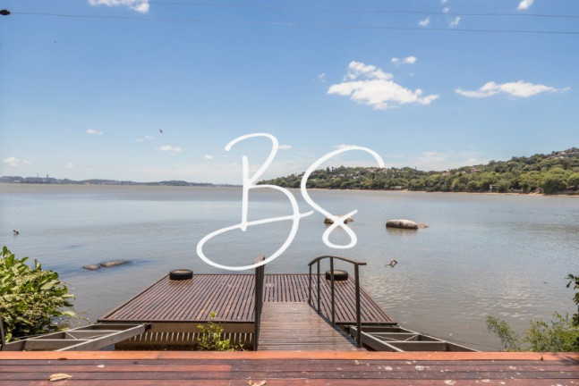 Imagem Casa com 4 Quartos à Venda, 470 m² em Pedra Redonda - Porto Alegre