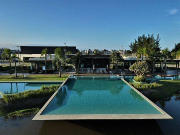 Imagem Casa de Condomínio com 4 Quartos à Venda, 278 m² em Centro - Xangri-lá