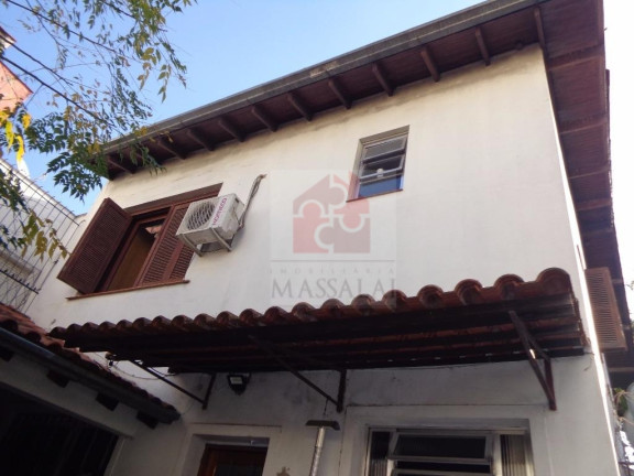 Imagem Casa com 3 Quartos à Venda, 150 m² em Menino Deus - Porto Alegre