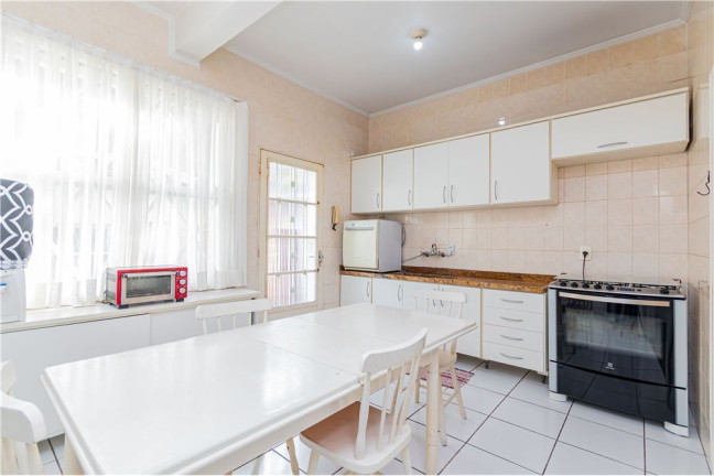Imagem Casa com 4 Quartos à Venda, 360 m² em Menino Deus - Porto Alegre