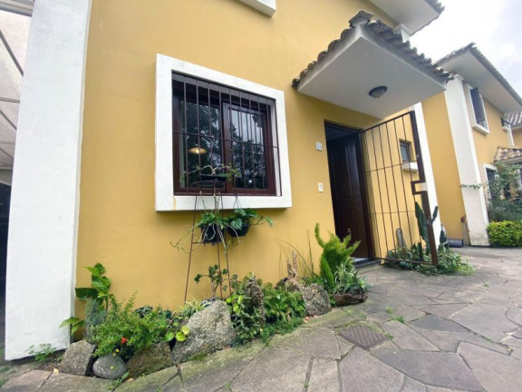 Imagem Casa com 3 Quartos à Venda, 102 m² em Partenon - Porto Alegre