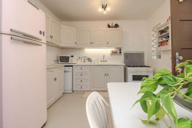 Imagem Casa com 3 Quartos à Venda, 246 m² em Ipanema - Porto Alegre