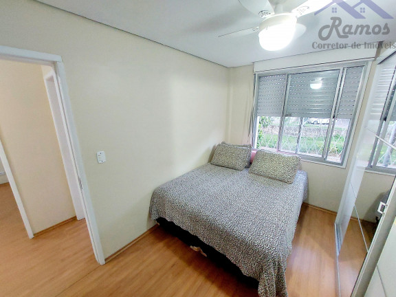 Imagem Imóvel com 3 Quartos à Venda, 62 m² em Vila Nova - Porto Alegre