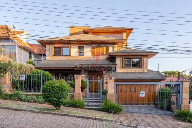 Imagem Casa com 4 Quartos à Venda, 498 m² em Ipanema - Porto Alegre