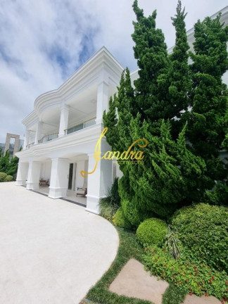 Imagem Casa de Condomínio com 4 Quartos à Venda, 932 m² em Centro - Xangri-la