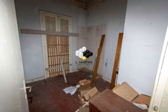 Imagem Casa com 5 Quartos à Venda, 144 m² em Independência - Porto Alegre