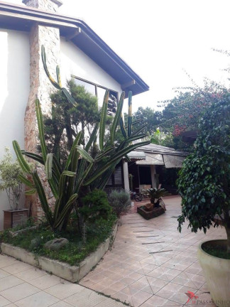Imagem Casa com 4 Quartos à Venda, 317 m² em Centenário - Torres