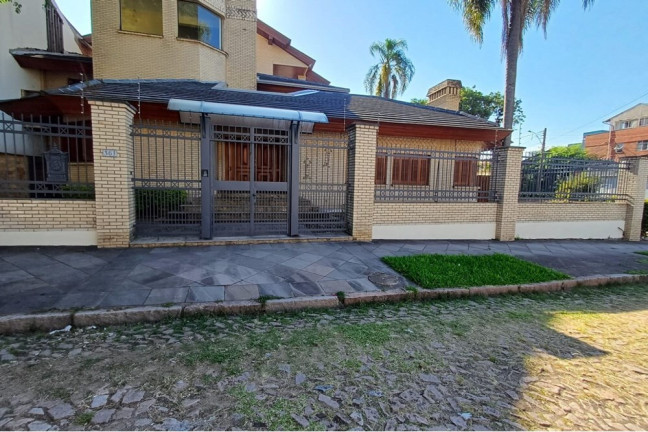 Imagem Casa com 4 Quartos à Venda, 738 m² em Partenon - Porto Alegre Imagem Casa com 4 Quartos à Venda, 738 m² em Partenon - Porto Alegre