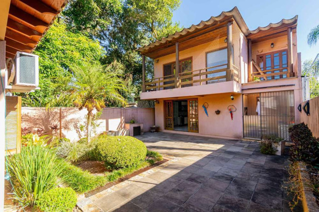 Imagem Casa com 6 Quartos à Venda, 374 m² em Tristeza - Porto Alegre
