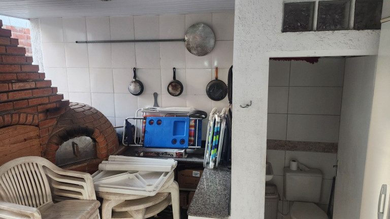 Imagem Casa com 4 Quartos à Venda, 220 m² em Gonzaga - Santos