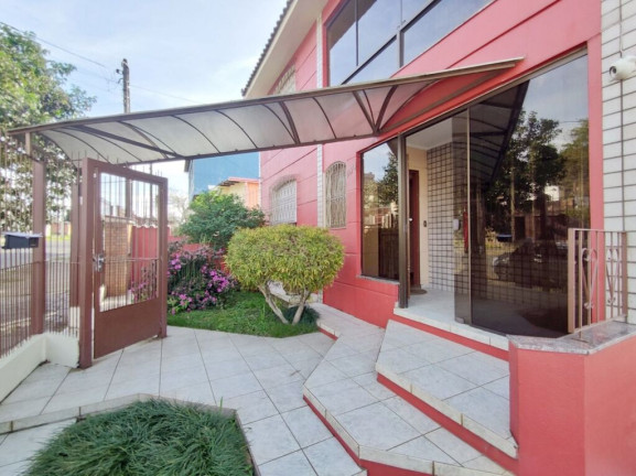 Imagem Casa com 4 Quartos à Venda, 256 m² em Glória - Porto Alegre