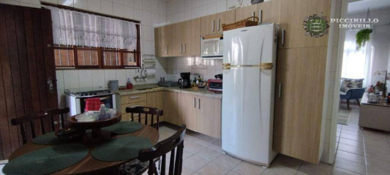Imagem Casa com 4 Quartos à Venda, 99 m² em Caiçara - Praia Grande Imagem Casa com 4 Quartos à Venda, 99 m² em Caiçara - Praia Grande