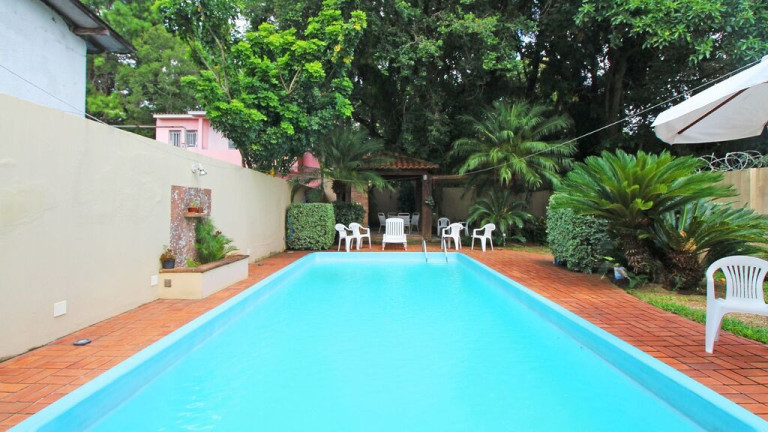 Imagem Casa com 4 Quartos à Venda, 243 m² em Partenon - Porto Alegre