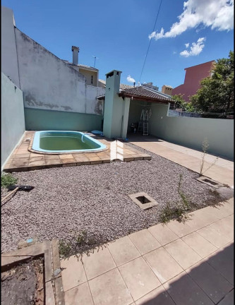 Imagem Casa com 3 Quartos à Venda, 88 m² em Nossa Senhora Medianeira - Santa Maria Imagem Casa com 3 Quartos à Venda, 88 m² em Nossa Senhora Medianeira - Santa Maria