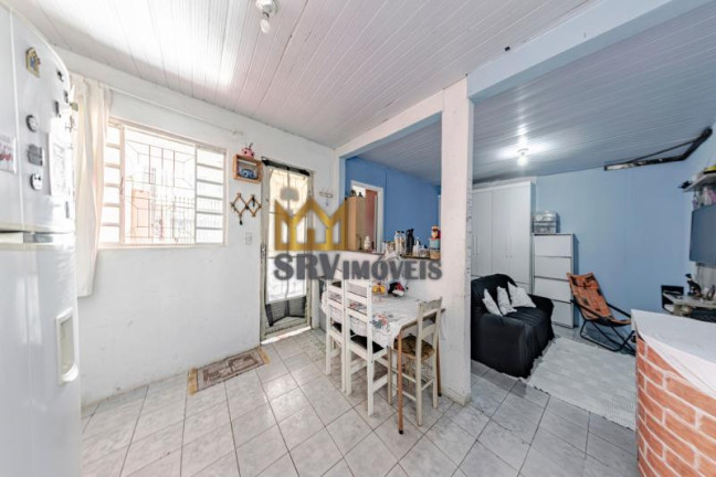 Imagem Casa com 2 Quartos à Venda, 55 m² em Uberaba - Curitiba