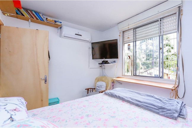 Imagem Imóvel com 2 Quartos à Venda, 50 m² em Vila Nova - Porto Alegre