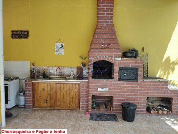 Imagem Casa com 5 Quartos à Venda, 450 m² em Canto Do Forte - Praia Grande