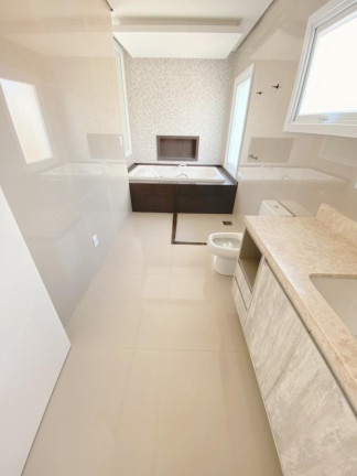 Imagem Casa de Condomínio com 4 Quartos à Venda, 295 m² em São Vicente - Gravataí