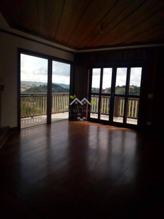 Imagem Casa com 4 Quartos à Venda, 240 m² em Vila Natal - Campos Do Jordão