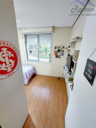 Imagem Imóvel com 3 Quartos à Venda, 62 m² em Vila Nova - Porto Alegre