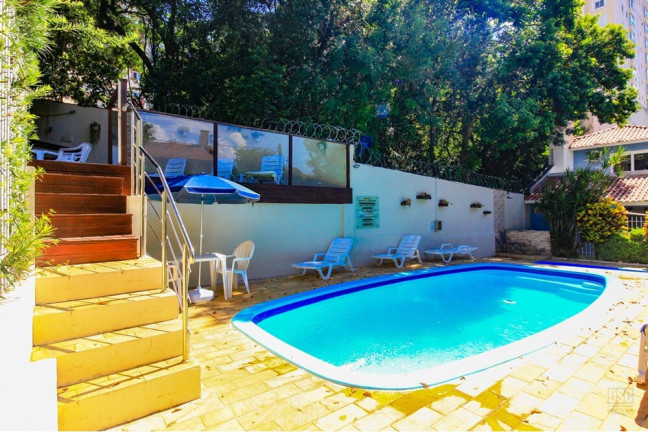Imagem Casa com 3 Quartos à Venda, 148 m² em Vila Nova - Porto Alegre Imagem Casa com 3 Quartos à Venda, 148 m² em Vila Nova - Porto Alegre