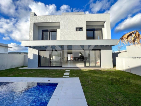Imagem Imóvel com 4 Quartos à Venda, 371 m² em Vila Nova - Porto Alegre