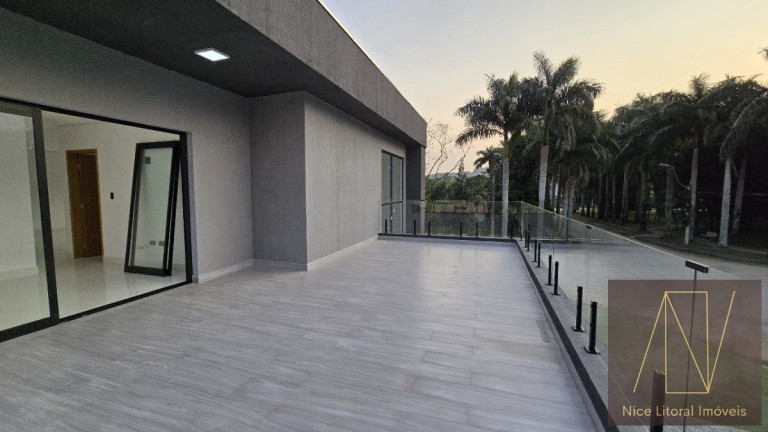 Imagem Sobrado com 4 Quartos à Venda, 300 m² em Massaguaçu - Caraguatatuba