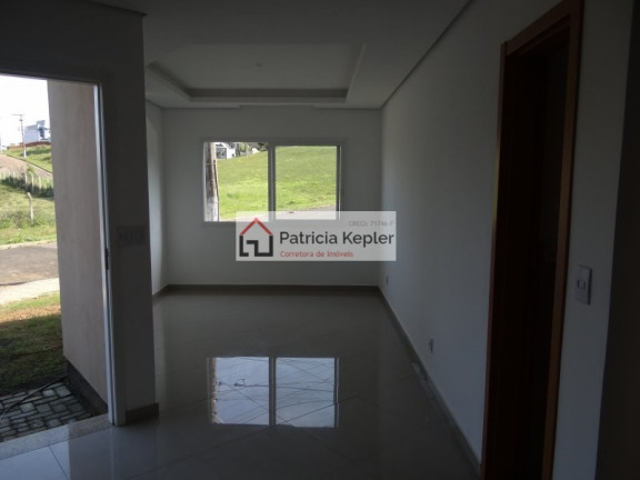 Imagem Sobrado com 3 Quartos à Venda, 112 m² em Mário Quintana - Porto Alegre