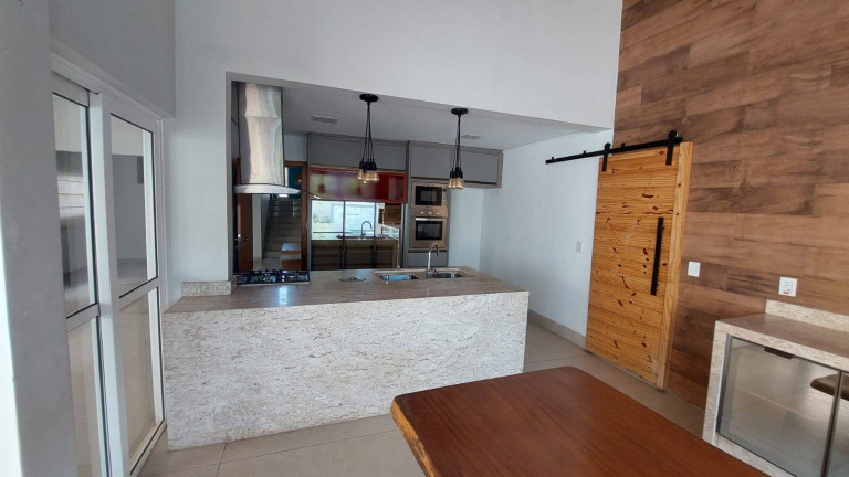 Imagem Casa com 4 Quartos à Venda, 375 m² em Condomínio Belvedere - Cuiabá