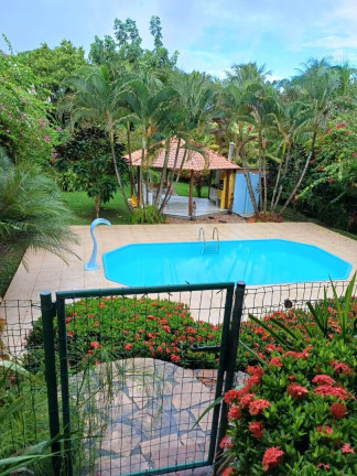 Imagem Casa com 4 Quartos à Venda, 340 m² em Busca Vida - Camaçari
