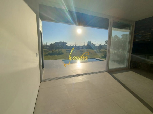 Imagem Casa de Condomínio com 4 Quartos à Venda, 247 m² em Centro - Xangri-la