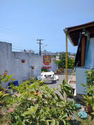 Imagem Casa com 7 Quartos à Venda, 403 m² em Capoeiras - Florianópolis