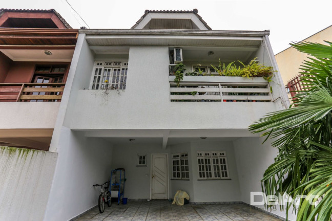 Imagem Sobrado com 4 Quartos à Venda, 221 m² em Jardim Das Américas - Curitiba